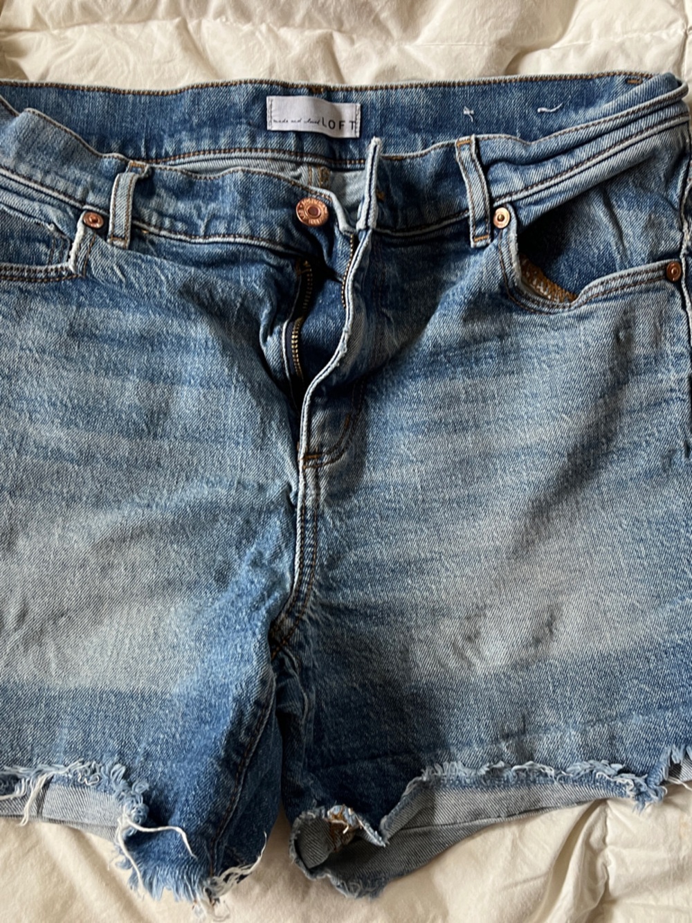 Light Wash Distressed Denim Cutoff Shorts